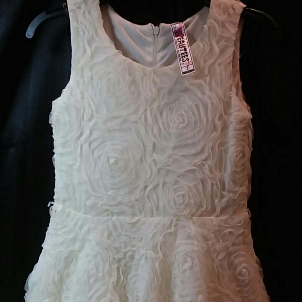 Rosette lace girls dress by Beautees. Includes a gold glitter belt.